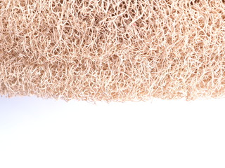 brown washcloth on a white background