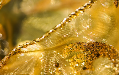 Golden abstract blur defocused background. Concept for New Years Eve, Christmas and happy holidays