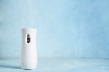 Modern air freshener on color background