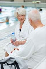 beautiful couple enjoying spa wellness treatments