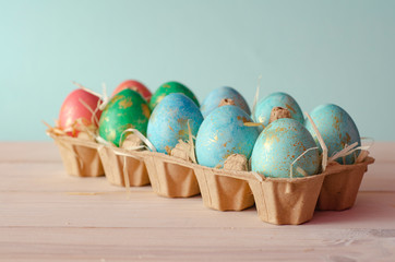  Easter eggs in a tray. Easter background
