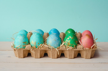  Easter eggs in a tray. Easter background