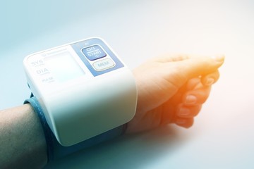  Tonometer on a female hand. Measurement of blood pressure and heart rate.