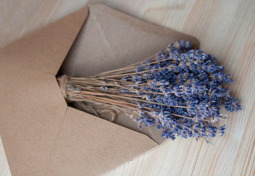 Bright Lavander On Wooden Background With Letter