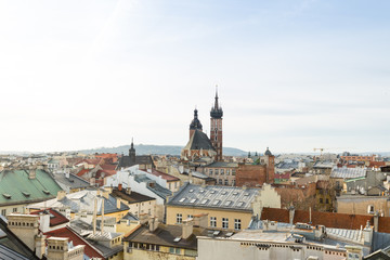Fototapeta na wymiar Panorama old town part of Cracow. Mariacki cathedral in Krakow. St. Mary's basilica, Old city center.
