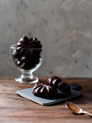 Homemade souffle candy in chocolate with vanilla. Candy bird's milk. Traditional russian zephyr in chocolate