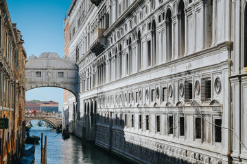 Naklejka premium VENICE, ITALY -APRIL 8: Gondolas and tourists on April 8, 2011 in Venice, Italy. Venice has an average of 50,000 tourists a day and was the 26th most visited city in the world.