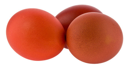 Red chicken eggs Isolated on a white background close-up.