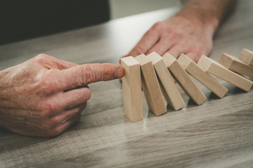 Concept of business control by stopping domino effect