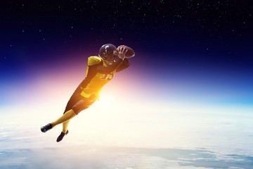 Obraz na płótnie Canvas American football player with space on the background
