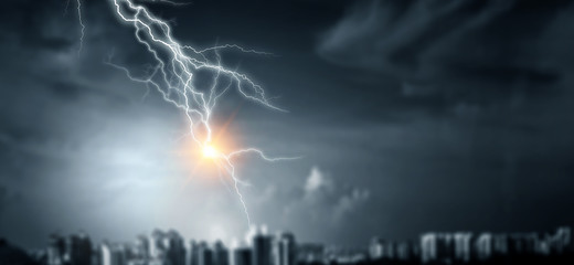 Lightning bolt at a dark night