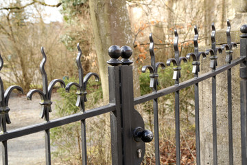 Metal fence. Metal curly fence in the park