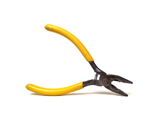 Close up of electrical pliers isolated on white background. Yellow handle pliers. Hand tool.