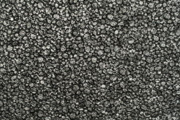 Grunge plastic foam texture close up view. Granulated texture macro shot.