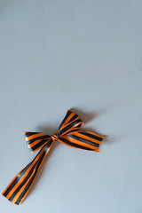 Orange and black Great patriotic War memorial ribbon. Victory day symbol in Russia isolated on white top down view. 