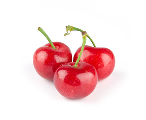 Fresh cherry isolated on white background.