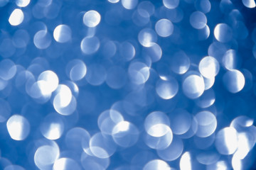 blue navy background glitter silver christmas texture abstract light glittering stars on bokeh. glitter vintage lights background