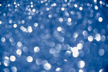 blue navy background glitter silver christmas texture abstract light glittering stars on bokeh. glitter vintage lights background