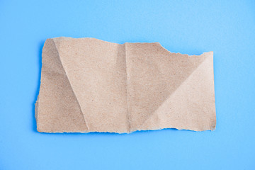  torn paper with blue background, ready for design