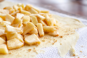 Homemade apple strudel with fresh apples. Cooking apple strudel