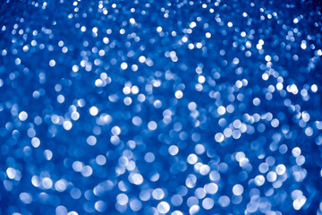 blue navy background glitter silver christmas texture abstract light glittering stars on bokeh. glitter vintage lights background