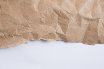Fototapeta na wymiar background old brown crumpled paper texture