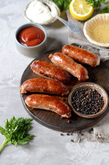 Homemade turkey (chicken) sausages with different sauces