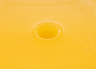 the waves after a few drops of orange juice.