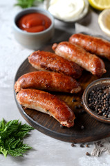 Homemade turkey (chicken) sausages with different sauces