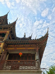 Traditional Asia Chinese architecture garden temple and tower in daytime