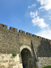 Fototapeta premium Traditional Asian Chinese wall and gate in daytime