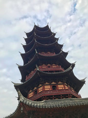 Traditional Asia Chinese architecture garden temple and tower in daytime