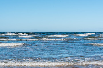 Fototapeta na wymiar Baltic Sea Beach with Waves in the Winter