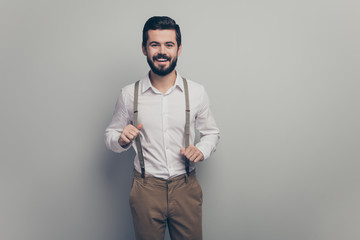 Fototapeta premium Portrait of candid imposing guy enjoy dream dreamy rest relax pull suspenders wear good look outfit isolated over grey color background