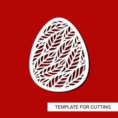 Stencil of a cute decorative easter egg. Floral ornament of carved leaves and spikes. Openwork template for laser cutting, plywood, cardboard, wood, metal engraving, paper cut, printing. Vector image.