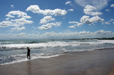 man walking on beach