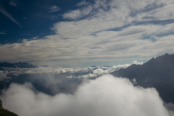 Fototapeta na wymiar Swiss Alps, Beautiful Alps, Mountains in clouds