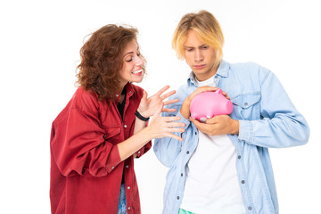 Stylish caucasian blonde man and young woman holds a moneybox isolated on white background