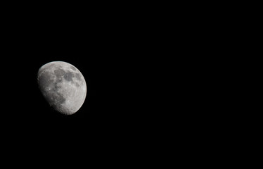Closeup of a Three Quarter Moon in a Black Sky