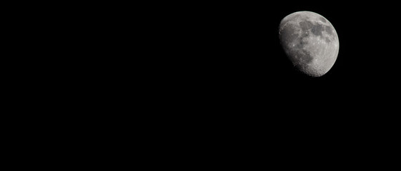 Closeup of a Three Quarter Moon in a Black Sky