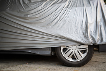 Car covered with waterproof cloth