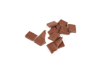 pieces of dark milk chocolate bar isolated on white background.