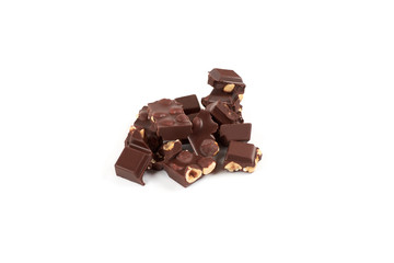 Chocolate pieces with nuts isolated on white background