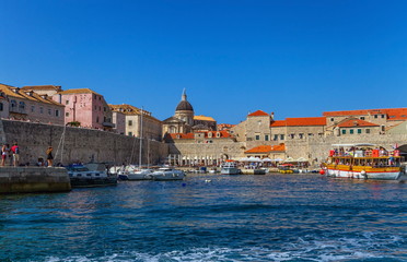Fototapeta na wymiar Dubrovnik old city harbor on the Adriatic Sea by day, South Dalmatia region, Croatia
