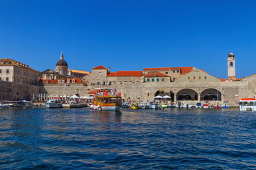 Fototapeta na wymiar Dubrovnik old city harbor on the Adriatic Sea by day, South Dalmatia region, Croatia