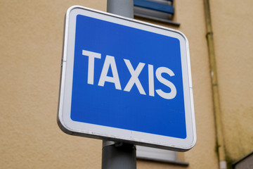 taxis road sign text parking space for cab taxi