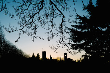 Bassano del Grappa, Vicenza - Italy: Santa Maria in Colle at sunset. Castle silhouette.