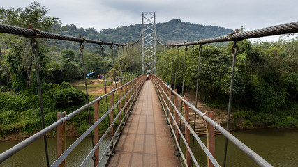 Fototapeta na wymiar Landscape view of the Inchathotty Suspension Bridge, Kerala, India
