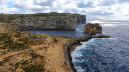 Fototapeta na wymiar Amazing Dwerja Bay at the coast of Gozo Malta - aerial photography