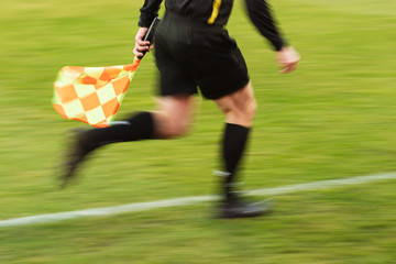 Assistant referee during football match